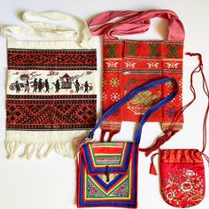 Lot of four Chinese purses circa the 1980s! Some were most likely made by China's ethnic minorities; the small red one is more traditional.  1) Natural cotton printed tote with fringe (in excellent condition except for some spotting on the strap as shown) 2) Woven orange-red tote with zipper front pocket (great condition, some fading to the pink strap) 3) Burlap purse with bright primary colored cotton applique strips and cross stitch embroidered details (excellent condition) 4) Little red silk satin embroidered padded drawstring bag (some discoloration at drawstring area as shown) Artisan Red Embroidered Bag, Red Rectangular Shoulder Bag For Festivals, Traditional Woven Bags For Festivals, Traditional Red Woven Bag, Traditional Red Woven Bags, Traditional Red Woven Shoulder Bag, Traditional Red Rectangular Bag, Traditional Red Shoulder Bag For Everyday Use, Vintage Red Shoulder Bag For Festivals