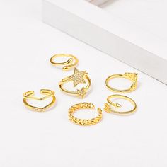 ❤ Versatile stackable knuckle rings set, contains 6 pieces 18K gold plated rings with different styles which has chain band, heart ring, shiny stars layered ring, arrow ring, simple band ring and 2-layered wave rings. Adjustable sizes from 8-12.


❤ Hypoallergenic and nickle free, ideal for ones with sensitive skin. Comply with EU Environmental Standards.
❤ Great gift for girlfriend, wife, lover, daughter, sister, granddaughter, friends, bridesmaids, bride.


❤ Perfect for occasions like Christmas, Birthday, New Year, Anniversary, Engagement, Wedding, Graduation, Statement, Valentine's Day.
❤ Fast and free shipping, 5-12 days delivery, dainty gift box and pouch included.

❤ Choose your own adventure with U7 versatile stackable rings, this gorgeous ring set contains 6 different rings, sized Trendy Gold Midi Rings, Trendy Gold Plated Midi Rings, Arrow Ring, Layered Rings, Simple Band, Wave Ring, Knuckle Rings, Rings Set, Gold Plated Rings