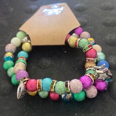 Two Multicolored Beaded Bracelets With Charms. 6 1/2 Inches With Stretchiness. Beaded Bracelets With Charms, Bracelets With Charms, Turtle Bracelet, Memorial Bracelet, Awareness Bracelet, Crystal Beads Bracelet, Craft Corner, Made Jewelry, Bangle Bracelets With Charms