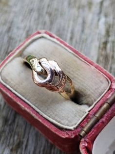 A beautiful solid 9 ct gold vintage ring. The band is solid 9 ct yellow gold with the knot rings fashioned in solid 9ct rose gold. A lovely mixed metal look. INTERNATIONAL BUYERS - please read the shipping information below. Follow us on Instagram for all our latest pieces and first Dibs! They don't all make it to our Etsy store: https://www.instagram.com/mooreperfectpieces/ Fully British Hallmarked - 375 hallmark,  denoting solid 9 ct gold, SJ makers mark Ring Size UK: L USA 5.75 EU 51 - resizing available for an additional fee - please get in touch before purchase Weight 1.5 g The face of the ring measures 8 mm Please be aware that we used a macro lens to photograph our item close up and allow you to see details, this may make them appear bigger on the screen than in person, so please ma Gold Knot Ring, Knot Ring, Macro Lens, Mixed Metals, Hallmark, Makers Mark, Vintage Rings, Fashion Rings, Etsy Store