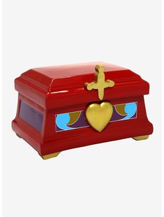 a small red box with a cross on the top and a heart in the middle