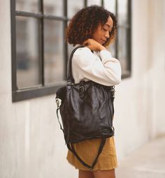 Update your everyday look with a clean-lines, useable tote (or crossbody) ideal for the lady boss who travels or for the sophisticated student. Sized right for carrying a laptop, MILDRED is your next leather carry-it-all handbag.  Dip Dyed to make each one unique, MILDRED has cushioned handles, a removeable, adjustable cross body strap, and zipper top closure to keep all things safe. Plenty of pockets for all your necessities, add MILDRED to your daily routine. Soft Leather Tote Travel Bag For On-the-go, Large Capacity Leather Shoulder Backpack For On-the-go, Trendy Everyday Travel Shoulder Bag, Trendy On-the-go Tote Laptop Bag, Chic Crossbody Travel Bag, Trendy Shoulder Travel Bag For Everyday Use, Chic Travel Bag With Adjustable Strap For Daily Use, On-the-go Satchel With Leather Handles, Trendy Everyday Soft Leather Satchel