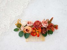 A beautiful flower comb from our new collection. You'll fall in love with beautiful autumn colors. Our lovely floral comb will be a keepsake for many years to come. It is a special touch to your bohemian look! Dimensions are given in centimeters 1 in = 2.54 cm The price is for 1 piece of of the flower comb. Take a look at our other accessories ---> https://www.etsy.com/shop/LolaWhiteShop Thank you for visiting our store!