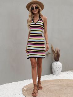 Our Shiela Knit Dress comes in playful colours of black, pink and yellow. Echoes of stripe patterns traveling down this knit textile that features a v neck, dress it up with our latest strappy sandal collection as a stylish summer look. Size Guide: Susan is 5’6” tall, and has a 33.5” bust, 24.8”waist, & 37.4” hips. She is wearing a S / US 4 / AU 8. This knit dress is true to size. Material: 100% Acrylic. Key Features: Mini length. V neckline. Relaxed fit. Sleeveless. Care Instructions: Machine w Striped Knit Dress, Knitwear Dress, Basic Dress, Selling Clothes, Knit Mini Dress, Pink And Yellow, Summer Look, Knit Jumper, Beach Dress