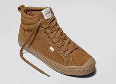 Our signature sneaker has been elevated to high-top status. Meet the OCA High, crafted from high-end, raw materials, it features lightweight cushion technology, the perfectly-weighted rubber sole, and classic cap-toe design. It's the quintessential old-school look made with new-school ethics. Now available in luxurious Triple Camel Suede. Canvas Sneakers Womens, Sustainable Brands, Toes Designs, Mens High Tops, High Top Sneaker, Sneaker Men, Comfortable Sneakers, Wishing Well, Suede Sneakers