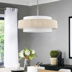 The 5-light shaded drum chandelier features a double drum design that completes the modern and elegant look. With two 6 inch and two 12 inch down rods, this fixture's height can be adjusted to a maximum height of 52". Its fabric drum shades help to soften lights and filter flickers in the light. This ceiling light is perfect to achieve your desired fashion or functional needs in your home. GETLEDEL 5-Light Brushed Nickel Modern/Contemporary Led Chandelier | FX-3912RP Beach House Lighting, Drum Shade Chandelier, Drum Light, Rattan Shades, Rustic Materials, Drum Chandelier, Chandelier Shades, Beachcrest Home, Chandelier Ceiling Lights