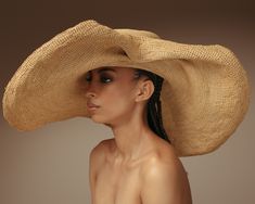 Crochet Glamour Hat 100% Toquilla straw. This natural fiber is known for its quality and beauty. The perfect beach-to-city accessory. Each hat takes approximately two to three days to weave by hand by our Ecuadorian artisans, and after pressed for shape. Indulge in luxury with our Crochet Glamour Hat. Made from high-quality toquilla straw, this hat is not only perfect for the beach, but also adds a touch of elegance to any city look. A must-have accessory for the fashion-forward. -We ship with D Chic Handwoven Toquilla Straw Panama Hat, Chic Natural Color Palm Leaf Hat, Chic Handwoven Natural Panama Hat, Chic Brimmed Palm Leaf Hat, Natural Woven Straw Hat For Kentucky Derby, Chic Handwoven Natural Hat, Handwoven Natural Straw Hat For Kentucky Derby, Chic Handwoven Wide Brim Hat, Chic Natural Color Handwoven Hat