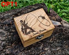 a wooden box with an image of a man fishing on the water and holding a fishing rod