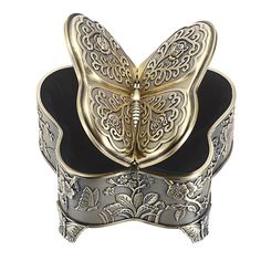 a gold and black butterfly shaped box