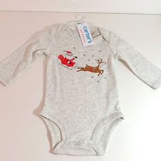 Carter's Onesie. Size 3 Months. The Onesie Is Christmas Themed With Santa And 1 Of His Reindeer. The Onesie Is Long Sleeve And Heathered Gray Color. Bundle And Save On Shipping, We Have A Large Variety Of Items. 10623a Long Sleeve Cotton Onesie For Holiday, Cotton Long Sleeve Onesie For Holiday, Holiday Long Sleeve Onesie, Long Sleeve Holiday Onesie, Winter Holiday Long Sleeve Onesie, Cute Christmas Holiday Onesie, Christmas Long Sleeve Onesie For Playtime, Christmas Long Sleeve Playtime Onesie, Christmas Long-sleeve Playtime Onesie