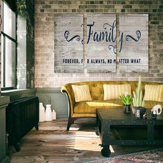 a living room filled with furniture and a brick wall