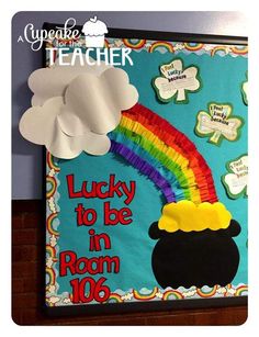 a cake with a rainbow on it and the words lucky to be in room 100