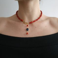 < Red coral necklace with blue pearl pendant > This product made according to the model of authentic traditional Ukrainian jewelry. The coral is modern, the design is vintage. Like 99% of the coral on the market these days, this coral has been dyed. I use bamboo coral which is not endangered or threatened in any way, unlike natural pink or red coral (the production of which is forbidden almost everywhere in the world). Bamboo coral doesn't mean it's not organic. Every bead of it has a dist Elegant Red Beaded Necklaces With Natural Stones, Elegant Red Beaded Necklace With Natural Stones, Red Pearl Necklace Gift, Red Choker Necklace With Lobster Clasp, Elegant Red Beaded Necklace With Lobster Clasp, Red Coral Pendant Necklace, Red Carnelian Single Strand Necklace, Red Pendant Necklace With Lobster Clasp, Red Beaded Necklaces With Natural Stones For Gift