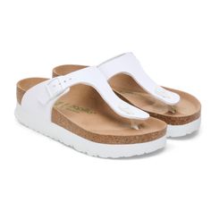 Best Sandals Of Women's For Summer Color: White Anatomically Shaped Cork-Latex Footbed; Exquisite This Popular Sandal Has Been Given An Update In A New Material, With A Vegan Version Now Available. It Is Entirely Free Of Animal Products, As Verified By Independent Testing Laboratories. The Color-Coordinated Details Round Off The Shoe’s Look Of Sophistication. Platform Eva Outsole Provides Enhanced Traction And Underfoot Cushioning In Every Step. Platform Height: 2.6 Cm White T-strap Sandals With Leather Footbed For Summer, White Footbed Sandals With Single Toe Strap For Beach, White Leather Footbed Flip Flops For Summer, White Single Toe Strap Footbed Sandals For Beach, White Single Toe Strap Beach Footbed Sandals, White Leather Footbed Open-toe Flip Flops, White Leather Flip Flops For Summer, White Toe Post Sandals With Textured Footbed, White Textured Toe Post Sandals