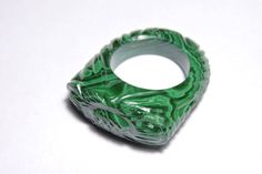 Buyer Will Receive 1 Piece Natural Malachite Full Carved Single Gemstone Made Ring.you will really love it.you will gift it to your love ones and friends. Product Details Product Name - Natural Malachite Full Carved Single Gemstone Made Ring. Gemstone - Natural Malachite Quantity - 1 Piece 100% Natural ----------------------------------------------------------------------------- THIS BEAUTIFUL ITEM IS AVAILABLE ONLY ON ETSY ------------------------------------------------------------------------ Luxury Green Collectible Rings, Luxury Green Crystal Ring With Gemstone, Green Malachite Rings As A Gift, Luxury Green Rings With Stone Setting, Green Carved Rings Perfect For Gifts, Green Malachite Rings For Anniversary, Green Carved Rings For Anniversary, Green Gemstone Ring With Stone Setting, Green Carved Jewelry For Anniversary