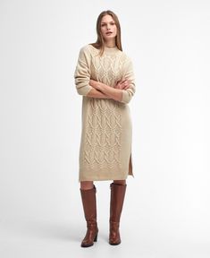 Elisha Cable-Knit Midi Dress The Barbour Elisha Knitted Dress delivers cosy warmth from the ribbed high-neck right down to the knee thanks to its wool-rich yarns and long sleeves. Boasting a classic cable-knit design for a true winter-ready look, it looks particularly stylish when paired with knee-high boots. Cable Knit Dress, Roll Neck Sweater, Long Sleeve Sweater Dress, Sweater Dress Women, Knitted Dress, Knit Midi, Weekend Wear, Knit Midi Dress, Wool Blend Sweater