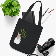 Designed with nature-approved materials, these canvas tote bags come with a 100% certified organic cotton body and web handles. The open main compartment adds daily function with easy access. .: 100% Certified Organic Cotton .: Medium-heavy fabric (9 oz/yd² (305 g/m Cotton Canvas Bag With Pockets For Shopping, Casual Cotton Shoulder Bag For Daily Use, Recyclable Cotton Bags In Natural Color, Recyclable Natural Cotton Bag, Recyclable Natural Cotton Bags, Eco-friendly Canvas Bag With Canvas Lining, Eco-friendly Cotton Bag With Pockets, Eco-friendly Cotton Bags With Pockets, Organic Recyclable Canvas Bag For Daily Use