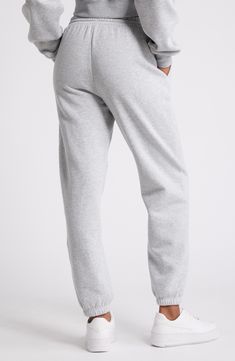 Work out or chill out in these comfy cotton-blend joggers designed with an easy tie waist. 29" inseam; 12" leg opening; 12 1/2" front rise; 16" back rise (size Medium) Elastic/drawstring waist 68% cotton, 32% recycled polyester Machine wash, tumble dry Imported Not available for sale and shipment to Germany Cotton Joggers With Drawstring, Cotton Activewear With Elastic Cuffs For Leisure, Cotton Tapered Leg Sweatpants For Lounging, Cotton Athleisure Joggers With Elastic Waistband, Cotton Athleisure Sweats, Cotton Relaxed Fit Joggers, Relaxed Fit Cotton Joggers With Elastic Cuffs, Relaxed Fit Cotton Joggers, Relaxed Fit Cotton Joggers For Leisure