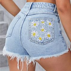 Brand New Embroidered Denim Shorts. Never Worn Embroidered Daisy Flowers On The Right Side Back Pocket. Embroidered Denim Blue Bottoms For Spring, Spring Embroidered Denim Blue Bottoms, Casual Denim Blue Bottoms With Floral Embroidery, High Waist Denim Bottoms With Floral Embroidery, High Waist Embroidered Denim Blue Bottoms, Summer Embroidered Cotton Jeans, High Waist Embroidered Bottoms For Spring, Casual Embroidered Mid-rise Bottoms, Trendy High-waisted Embroidered Bottoms