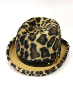 DESCRIPTION This is an absolutely fabulous vintage hat from the 70s made by Yves Saint Laurent in a hard to come by style.  The hat is made out of a velvety soft fur felt that has a leopard print design done in dark brown, black, and light brown.  The hat has an upturned bumper brim that also has a leopard print on it.  There is a black leather hat band with a gold tone metal accent on one side.      SIZING The hat does not have a size tag, but I believe it would best fit a size Medium.  I perso Retro Flat Brim Fedora For Winter, Retro Winter Fedora With Flat Brim, Retro Winter Fedora With Curved Brim, Vintage Fur Felt Fedora, Retro Winter Hat With Flat Brim, Retro Flat Brim Winter Hat, Retro Top Hat With Curved Brim For Winter, Vintage Hat Bands For Fall, Retro Curved Brim Top Hat For Winter