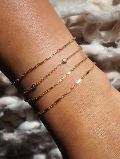 Designed with mixed square and rectangular links, the Dayna Bracelet will add a unique texture to your stack. Designed as part of our BBT Luxe collection, you'll never have to take this bracelet off, as we pride ourselves on fine jewelry without any of the markups. 14k Solid Gold Length: 6" + 1" Extender Width: 2 mm Pieces from this collection are not eligible for any discounts or promotions Dainty Everyday Stackable Bracelets, Dainty Stackable Bracelets For Everyday, Dainty 14k Gold Jewelry With Rectangular Links, Minimalist Stackable Bracelets For Everyday, Minimalist Everyday Jewelry With Bracelet Strap, Everyday Minimalist Jewelry With Bracelet Strap, Everyday Dainty Stackable Chain Bracelet, Minimalist Stackable Jewelry With Rectangular Links, Dainty Jewelry With Delicate Rectangular Chain