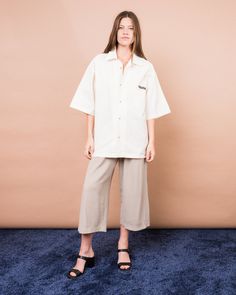 Vintage Oversized Cream MAZDA Button Up (S/M) Beige Relaxed Fit Camp Shirt With Pockets, Short Sleeve Shirt With Buttons For Loungewear, Oversized Short Sleeve Shirt With Pockets For Spring, Oversized Beige Shirt With Button Closure, Everyday Relaxed Fit Button-up Camp Shirt, Oversized Short Sleeve Shirt With Pockets, Cream Relaxed Fit Shirt For Everyday, Oversized Short Sleeve Shirt With Pockets For Summer, Cream Relaxed Fit Button-up Shirt