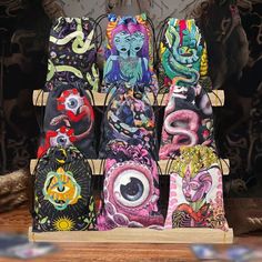 there are many bags with designs on them