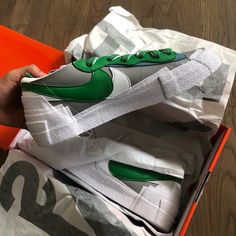 The Sacai X Nike Blazer Low “Classic Green” Is A Spring 2021 Release That Follows The High Fashion Brand’s Original Collaboration With Nike On The Blazer Mid From 2019. Like All Of Its Partnerships With Nike, Sacai’s Blazer Low In The “Classic Green” Colorway Continues To Play With Proportions By Applying “Two” Of Every Design Element, Including Two Leather Swooshes In White And Classic Green On Both Sides Of The Light Grey Leather Base. Dual Laces, One White, One Green, Can Be Found Layered Ove Nike Canvas Shoes With Round Toe, Nike Canvas Shoes With Vulcanized Sole And Round Toe, Green Canvas Shoes With Contrast Sole, Nike Low-top Canvas Shoes With Vulcanized Sole, Nike Low-top Canvas Shoes With Rubber Sole, Nike Low-top Vulcanized Canvas Shoes, Nike Low-top Canvas Shoes With Branded Insole, Nike Custom Slip-on Sneakers With Speckled Midsole, Nike Green Skate Shoes With Speckled Midsole