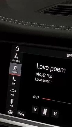 an image of a car's radio screen with the words love poem on it