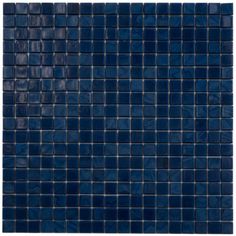 a blue tile wall that looks like it is made out of dark blue glass tiles