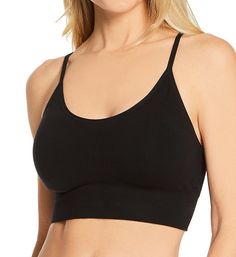 Classic, basic and sexy, this cute cropped cami bralette shows off your midriff. Made with the natural comfort of cotton, nylon, and spandex for stretch ease. Wireless, contour t-shirt cups are sewn into front, and have light padding for a smooth shape. Rounded V-shaped neckline holds in place with elastic binding at the edge. Wide, ribbed stretch fabric underband adds more height and support. Tall, seamless sides and back are lined with same fabric, with elastic binding at top and underband at Low-cut Crop Top With Built-in Bra For Loungewear, Seamless Construction Crop Top, Everyday Cropped Seamless Crop Top, Everyday Seamless Cropped Top, Trendy Seamless Crop Top For Everyday, Solid Cropped Camisole With Built-in Bra, Casual Seamless Cropped Sports Bra, Scoop Neck Crop Top With Built-in Bra, Trendy Seamless Crop Top Sports Bra