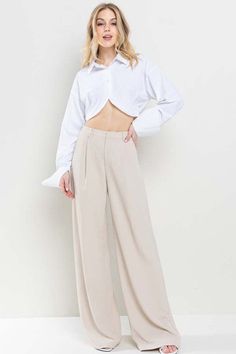 Enhance your wardrobe with our Nude Wide Leg Pants. Made with a flattering wide leg design and convenient pockets, these pants offer both style and functionality. Perfect for any occasion, these pants are a must-have for any fashion-forward individual. Elevate your look and stay on trend with these versatile and comfortable pants. Fabric & fit: 100% polyester Model is wearing size Small. Comfortable Pants, Pants Large, Leg Design, Elevate Your Look, Leg Pants, Wide Leg Pants, Must Haves, Fashion Forward, Wide Leg