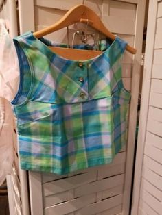 Plaid Sleeveless Tops, Sleeveless Plaid Tops For Picnic, Plaid Sleeveless Tops For Picnic, Fitted Sleeveless Top For Picnic, Retro Green Sleeveless Tank Top, Retro Green Tank Top For Spring, Green Retro Cotton Tank Top, Retro Green Cotton Tank Top, Green Casual Top For Picnic