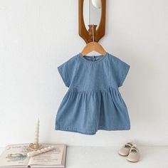 ☀️ Summer Fun Starts Here! ☀️ Your little fashionista will be the star of every playground and picnic in this adorable Soft Denim Dress. Crafted from the softest, breathable cotton worsted, it's as comfy as it is stylish. Choose from short sleeves or sleeveless for endless warm-weather fun. The classic denim look pairs perfectly with everything in her closet, making it a versatile must-have for any baby girl's wardrobe. Plus, it's machine washable for easy peasy care! This denim dress is perfect for ages 6-36 months and makes an amazing gift for baby showers or birthdays. #babygirlclothes #summeroutfit #babyfashiontrends #babygirldress #denimdress Specifications: Style: Casual Season: Summer Age Range: 6 - 36 months Gender: Girls Material: Cotton Fabric Type: Worsted Pattern Type: Solid Sl Kids Princess Dresses, Baby Fashion Trends, Denim Short Dresses, Summer Outfits Kids, Princess Dresses, Romper Outfit, Girls Blouse, Girls Wardrobe, Easy Peasy