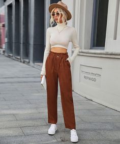 Always be comfy in the Chill Out Days Pocketed Jogger Pants in caramel that features a high rise waist. Size Guide: Gianna is 5’6” tall, and has a 33.5” bust, 24.8”waist, & 37.4” hips. She is wearing a S / US 4 / AU 8. This overall is true to size. Material: 65% Polyester, 35% cotton Feature: Relax fit. Elastic Waistband. Pocketed. Straight. Care Instructions: Machine wash / Cold hand wash Brown High Waist Relaxed Fit Bottoms, Baggy Brown Pants For Fall, Brown Tapered Leg Bottoms For Fall, Relaxed Fit Brown Bottoms For Fall, Chic Baggy Brown Bottoms, Trendy Brown Bottoms For Loungewear, Trendy Brown Loungewear Bottoms, High Waist Brown Bottoms For Loungewear, Brown High-waist Bottoms For Loungewear