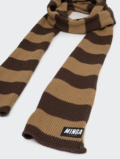 Add to your outerwear accessories collection and shop our Rori Stripes Brown Honey Scarf, the perfect final touch to any look. Bringing y2k, grunge, and dark academia vibes with a striped design and brown honey hues. Ethically made with international shipping available. Grunge And Dark Academia, Dark Academia Vibes, Minga London, Y2k Accessories, Striped Scarf, Striped Scarves, Girls Stripes, Accessories Collection, Y2k Grunge