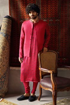 Cherry red straight kurta with all-over printed motifs. Comes with Nehru jacket enhanced with placement resham-dabka work and churidar.
Component: 3
Embroidered, Printed
Neckline: Mandarin Collar
Sleeve Length: Bundi: Sleeveless
Fabric: Tusser Silk, Satin Silk
Color: Red
Welt pocket
Closure: Bundi: Front buttons - Aza Fashions Punit Balana, Red Kurta, Kurta Set For Men, Silk Kurta, New Address, Nehru Jackets, Indian Fashion Designers, Satin Silk, Kurta Set