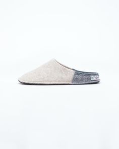 Description: The Nuvola Bico in beige and grey is our soft clog slipper, fully crafted in wool with a 1.5 cm interior heel height EVA insole for added comfort. The Nuvola retains the look of a slipper with the cushioned feel of a sneaker. Designed for the perfect amount of support and feather lightweight, Nuvola feels almost like walking on a cloud. Details: 100% Wool felt upper Two tone design: Colored front with light grey rear and insole Removable 1.5 cm interior heel height EVA insole - for Classic Beige Clogs With Rubber Sole, Beige Slip-on Slippers With Textured Footbed, Comfortable Wool Closed Toe Clogs, Gray Slip-on Slippers For Indoor Use, Beige Closed Toe Cushioned Slippers, Beige Slip-on Slippers With Cushioned Footbed, Gray Slip-on Indoor Slippers, Beige Cushioned Slip-on Slippers, Beige Textured Slip-on Slippers