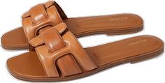 Casual Slip-on Sandals With Leather Lining, Casual Leather Lined Slip-on Sandals, Casual Leather-lined Slip-on Sandals, Casual Flat Sandals With Leather Lining, Comfortable Synthetic Sandals With Leather Lining, Casual Leather Slides With Open Heel, Brown Slides With Branded Insole, Casual Synthetic Slides, Trendy Leather Closed Toe Slides