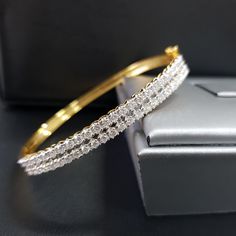 "💗💎Description: Tennis Bangle Two Row Diamond Real Gold Bracelet Worth Best Self Gift 💗💎Material: Tennis Bangle Two Row Diamond 9K- Gold White ,Yellow Gold, white gold or rose gold Diamonds: Diamonds round billion cut top 48pcs Weight : 1.65Ct Gold Weight:9.60G. 1 pcs. 💗💎What Color Diamond & Clarity Q&A Diamond Color : H Diamond Clarity: VS-SI Diamond Cut - EXCELLENT 💗💎 Q&A Are Real Diamonds? What type of Diamond do you use ? YES, Diamond tester is verify are real diamond 100 Gold And Diamond Bracelet For Women, Elegant Yellow Diamond Bracelet For Formal Occasions, Classic Yellow Bracelet, Yellow Bangle Bracelet For Anniversary, Yellow Bangle Bracelets For Formal Occasion, Elegant Yellow Gold Jubilee Bracelet, Yellow Bangle For Formal Occasions, Yellow Jubilee Bracelet Jewelry For Wedding, Elegant Yellow Bangle Bracelets