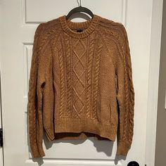 Classic Cable Knit Sweater From The Gap In A Lovely And Versatile Camel/ Tan Color. Crewneck. Women’s Size Large. Never Worn. Brown Open Knit Crew Neck Sweater, Gap Crew Neck Sweater For Fall, Fall Brown Open Knit Sweater, Cozy Brown Open Knit Sweater, Gap Knit Sweater For Fall, Casual Brown Open Knit Sweater, Casual Brown Pointelle Knit Sweater, Casual Gap Sweater For Fall, Cozy Fall Tops From Gap