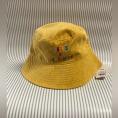 Your Kid Will Be Ready For Their Sunny Adventures With The 'Lets Be Friends' Bucket Hat From Cat And Jack In Mustard Yellow. Made From Soft Material, This Attractive Hat Offers A Comfy Fit And The Broad Brim Will Protect Their Eyes From The Sun. This Bucket Hat Makes A Great Pick For Beach And Picnic Days And Also Pairs Well With Any Casual Outfit For An Exciting Look. Classics With An Imagination Of Their Own. Color: Mustard/Yellow. Pattern: Letters. Material: Polyester Fb1-003 Casual Yellow Cotton Bucket Hat, Fun Yellow Bucket Hat For Spring, Yellow Cotton Bucket Hat For Spring, Trendy Yellow Bucket Hat For Spring, Spring Yellow Cotton Bucket Hat, Playful Yellow Bucket Hat For Spring, Playful Yellow Adjustable Bucket Hat, Yellow Adjustable Cotton Bucket Hat, Trendy Yellow Bucket Hat