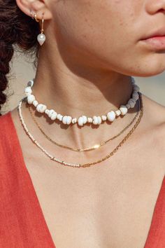 This luxurious gold and puka shell necklace evokes visions of Hawaii's white sands and soothing shores. Layer this with other beaded beauties and you'll be ready for your tropical escape. ✦ DETAILS ✦ ✧ Name: Keone (keh-OH-neh) - Sand ✧ Adjustable Length. ✧ White Puka Shells. ✧ 14kt Gold Filled with lobster clasp. ✧ All Ke Aloha Jewelry pieces come packaged thoughtfully, beautifully, and ready for gift giving. ✦ MORE GOLD NECKLACES ➤ http://www.etsy.com/shop/kealohajewelry?section_id=11346397 ✦ S Luxury Shell Necklaces For Beach, Kukuiula Necklace Bead, White Beachy Jewelry For Vacation, Beachy White Jewelry For Vacation, White Beachy Jewelry For The Beach, White Beachy Jewelry For Beach, White Shell Jewelry For Vacation, White Strand Jewelry For The Beach, Sand-colored Strand Jewelry For Vacation