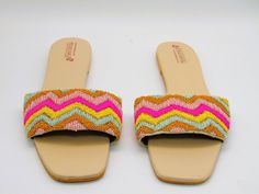 These espadrille like sandals are super cute for the summer, they offer a bright design of floral with leaves to add. These also have a beaded design on some of the flowers and leaves. They are also super comfy with a comfortable sole to walk in all day. These would be cute for a picnic or a photoshoot. Don't miss out on these cute sandals! See our page for more of our collection of shoes we offer. We ship out in a timely matter, wrapped in care for a safe secure trip to your location. Thank you Flat Espadrilles For Spring And Summer, Spring Summer Flat Espadrilles, Spring Vacation Flats With Removable Insole, Embroidered Summer Flats, Spring Vacation Flat Espadrilles, Summer Embroidered Espadrilles With Round Toe, Closed Toe Flats For Spring Vacation, Spring Vacation Closed Toe Flats, Summer Beach Flats With Open Heel