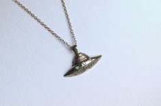 Urobune UFO Pendant – Sofia Zakia Sofia Zakia, Feminine Luxury, Alien Spaceship, The Quiet, Precious Metal, Jewelry Branding, Precious Metals, Sofia, Natural Diamonds