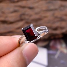 WELCOME TO ARTNGEM IIndian Gemstone Ring,Ring Size 7,Natural Red Garnet Gemstone 2.9 Gram Radiant Shape Ring ,92.5 Silver Delicate Ring,TOP Garnet January Gift Gemstone : Garnet Stone Shape : Radiant Stone size :9x7 MM Ring Weight :- 2.9 Gram Ring Size : 7 US 92.5 Sterling Silver Ring Quantity : Buyer Will Get Received One Ring BEST QUALITY AT LOW PRICE. = = = = = = = = = = = = = = = = = = = = = = = = = = = = = = = PLEASE ADD THIS IN YOUR CART FOR FAST SHIPPING WITH OTHER ITEMS. https://www.etsy Emerald Cut Garnet Gemstone Rings, Emerald-cut Garnet Gemstone Rings, Emerald Cut Garnet Rings For Gift, Emerald Cut Garnet Rings As Gift, Rectangular Gemstone Crystal Ring Gift, Rectangular Crystal Gemstone Ring For Gift, Sterling Silver Rings With Rectangular Birthstone, Crystal Ring With Rectangular Gemstone For Gift, Fine Jewelry Garnet Rectangular