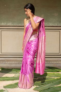 Periwinkle pink saree with gold vintage floral buttis all over and meenakari border on pallu. Comes with running blouse piece.
Components: 1
Pattern: Woven
Type Of Work: Floral buttis
Fabric: Silk Banarasi
Color: Pink
Other Details: 
Note: Stitched blouse and necklace worn by the model is not for sale
Disclaimer: The joint fabric pieces may vary. Designers unique process ensures that the placement of fabric will always be similar but not same. They always create the product with stretch fabrics Pre-draped Saree For Puja Festivals, Semi-stitched Bollywood Blouse Piece With Tilla, Navratri Bollywood Style Blouse With Tilla Details, Traditional Pre-draped Paithani Silk Saree, Diwali Semi-stitched Tilla Blouse Piece, Semi-stitched Tilla Blouse Piece For Navratri, Fitted Pre-draped Saree With Zari Weaving For Puja, Bollywood Style Blouse Piece With Tilla For Festivals, Traditional Chanderi Blouse Piece With Tilla