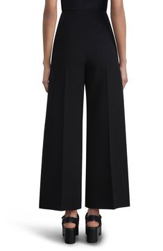 For pre-fall 2023, Lafayette 148 offers these contemporary pants immaculately tailored in a wide-leg, ankle-length silhouette from signature Finesse crepe. An overlay panels lends added drape and fluid movement, while neat creases at the front and back reinforce the smart appeal. 27" inseam; 25" leg opening; 11 1/2" front rise; 17" back rise (size 8) Zip fly Front slant pockets Unlined 71% acetate, 29% polyester Dry clean Imported Designer Clothing Elegant Cropped Leg Dress Pants For Work, Elegant Cropped Leg Workwear Pants, Elegant Cropped Leg Business Casual Pants, Elegant Cropped Leg Pants For Business Casual, Elegant Cropped Leg Dress Pants For Office, Elegant Tailored Cropped Leg Dress Pants, Elegant Cropped Leg Bottoms For Business Casual, Ankle-length Evening Pants, Tailored Ankle-length Wide Leg Pants For Evening