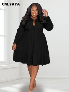 "Introducing the chic and versatile CM.YAYA Plus Size Long Sleeve Turn-down Neck Single Breasted Shirt Style Smock Dress for the trendy fashionista. This stunning ensemble effortlessly combines style and comfort, perfect for the 2022 Winter and Autumn seasons. Embrace the season's fashion with this exquisite ruffle dress designed exclusively for women.Crafted with attention to detail, the dress features a flattering shirt-style design with long sleeves and a turn-down neckline, offering a touch Solid Button-up Shirt Dress With Buttons, Button-up Shirt Dress With Buttons, Fall Solid Shirt Dress With Buttons, Fall Solid Color Shirt Dress With Buttons, A Line Shirt, Gown Silhouette, Ruffled Shirt, Lapel Design, Floral Dress Formal