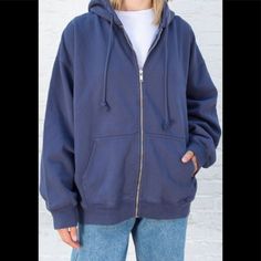 Basic Zip-Up Hoodie With Two Pockets And A Drawstring Hood. Fabrics: 66% Cotton, 34% Polyester Measurements: Oversized Fit: 29" (74 Cm) Length, 28" (71 Cm) Bust Made In: China Nwot Cozy Blue Hoodie Outerwear, Oversized Blue Hooded Jacket With Drawstring, Blue Oversized Outerwear With Adjustable Hood, Blue Oversized Fleece Outerwear, Navy Hoodie With Adjustable Hood For Fall, Blue Fleece Hooded Jacket For Fall, Navy Hooded Sweatshirt For Fall, Blue Hooded Jacket With Drawstring For Fall, Trendy Blue Hooded Jacket For Fall